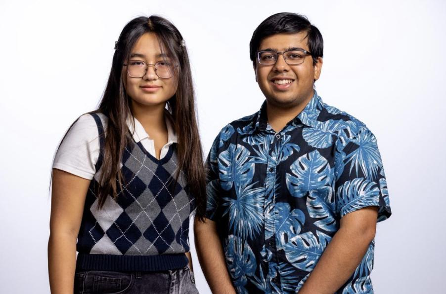 Anne and Anshul standing next to each other at T-Mobile Headquarters